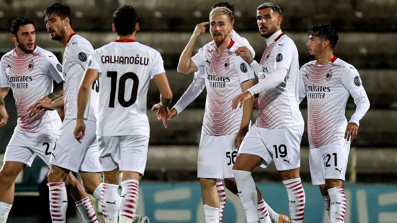 AC Milan players celebrate after scoring a goal against Rio Ave in the Europa League.