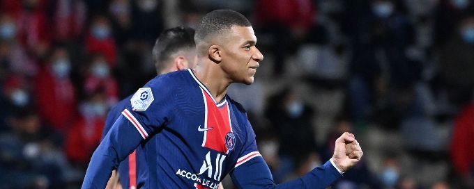 Mbappe double helps PSG beat 10-man Nimes and top Ligue 1