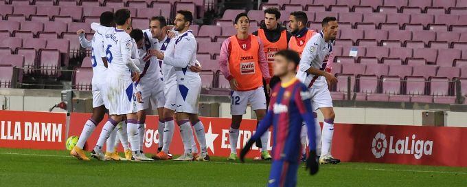 Barcelona held by Eibar as Lionel Messi watches from stands