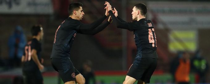 Man City survive FA Cup scare at Cheltenham with late goals