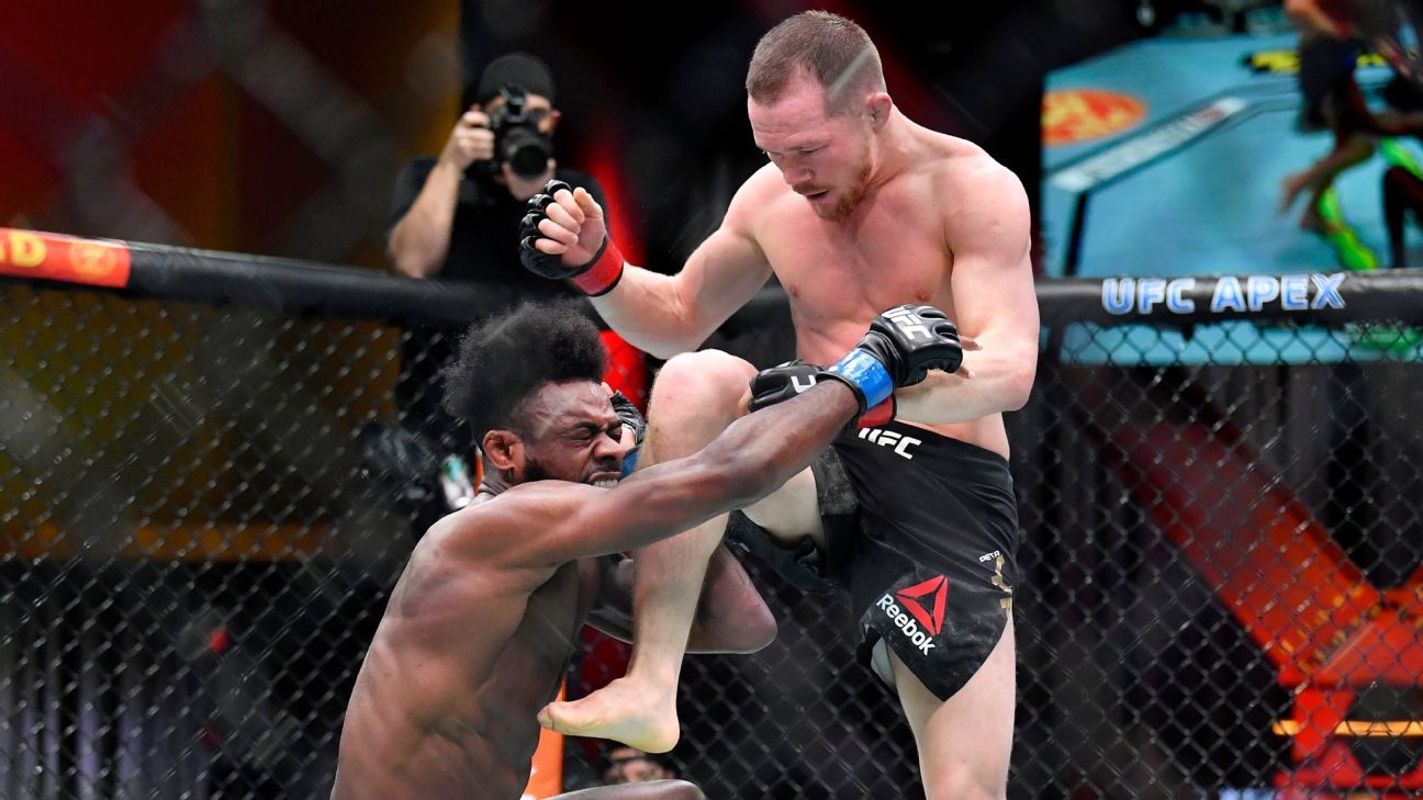 Aljamain Sterling wins UFC bantamweight title after Petr Yan is disqualified for illegal knee