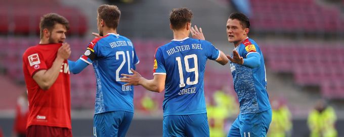 Second-tier Kiel stun Bundesliga's Cologne 1-0 in playoff first leg