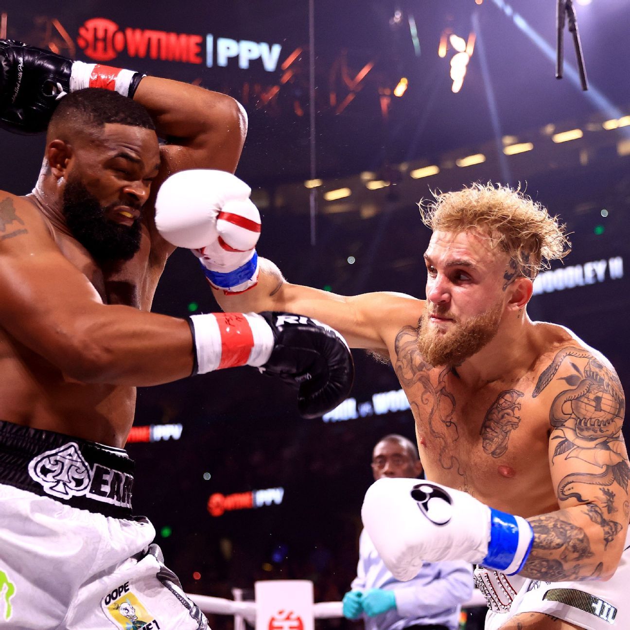 Jake Paul stops Tyron Woodley with one-punch KO