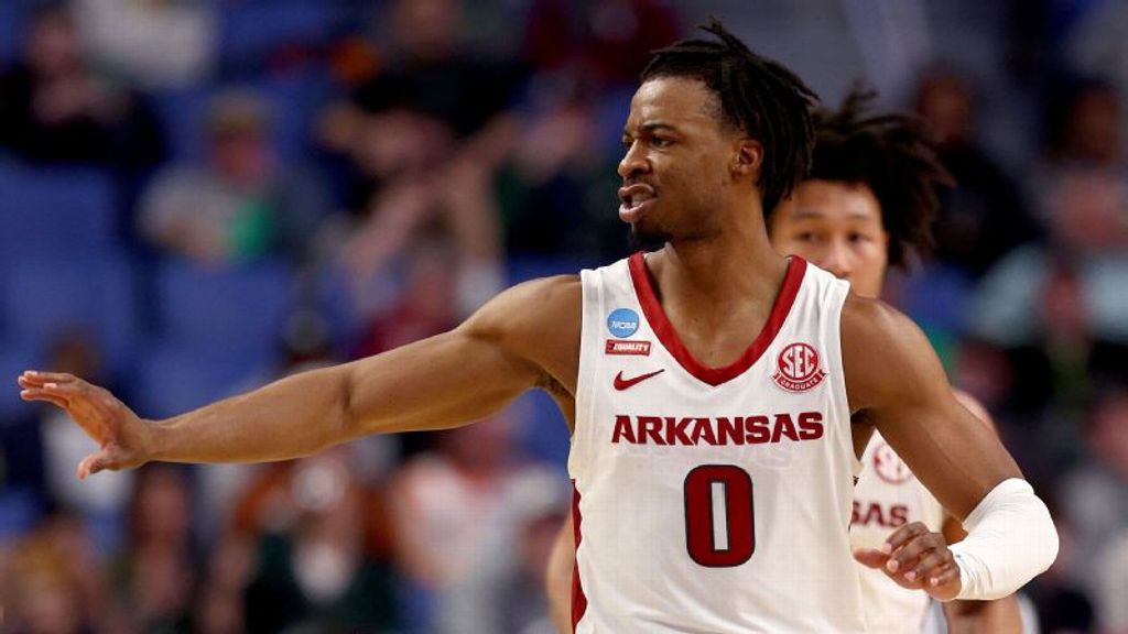 Arkansas holds off feisty Vermont to move on