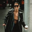 Liz Cambage's all-Gucci fit, Sami Whitcomb's NBA Jam spinoff highlight eye-catching WNBA fits