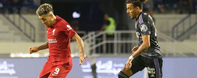 Lacazette double downs Liverpool as Salah misses penalty