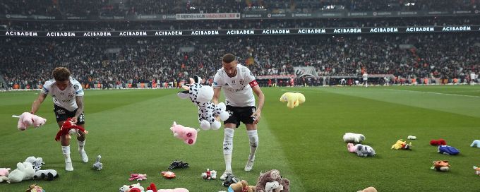Besiktas game stopped as fans throw toys on pitch to donate to Turkey, Syria earthquake victims