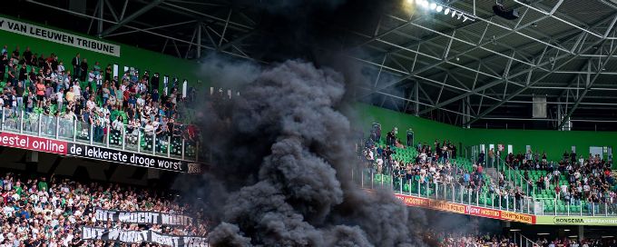 Groningen-Ajax clash abandoned after fireworks, smoke bombs thrown on pitch