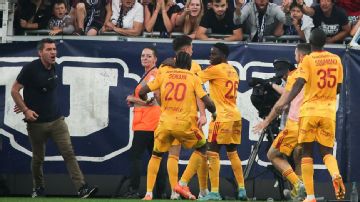 Bordeaux promotion bid in danger after fan assault on Rodez player ends game