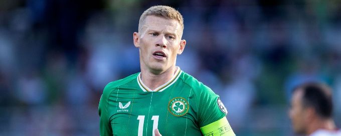 Wrexham sign Ireland midfielder James McClean from Wigan