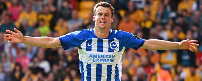 Brighton go top after hitting four past hapless Wolves