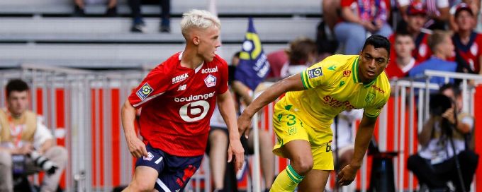 Ten-man Lille earns first win of season by downing Nantes 2-0 in French league