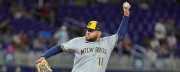 Rowdy night: Brewers 1B pitches 9th of clincher
