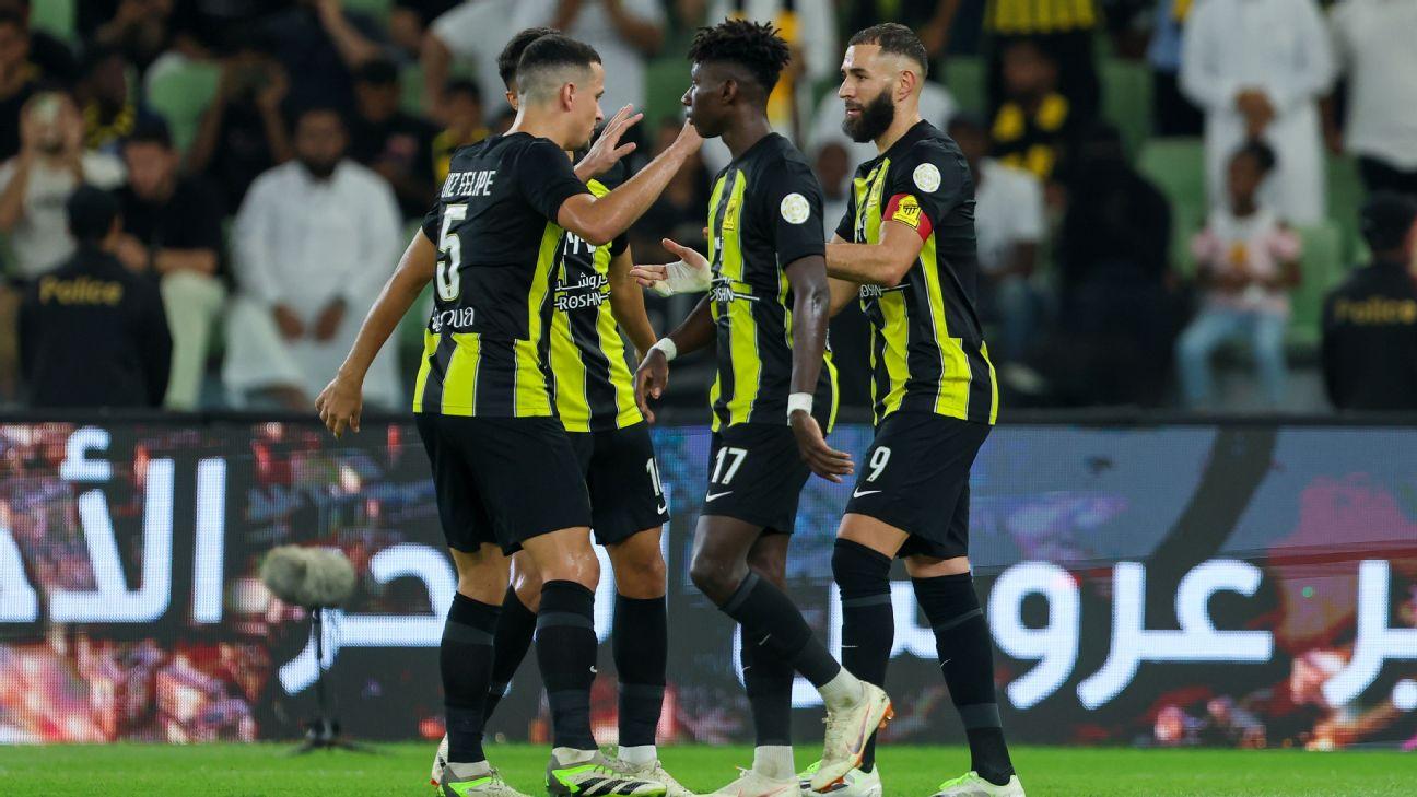Karim Benzema celebrates scoring one of his three goals for Al Ittihad in their win over Abha.
