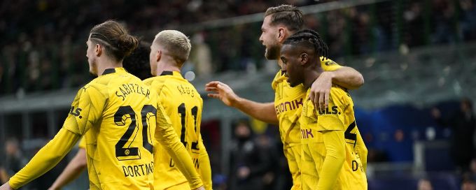 Dortmund reach Champions League last 16 with win at Milan