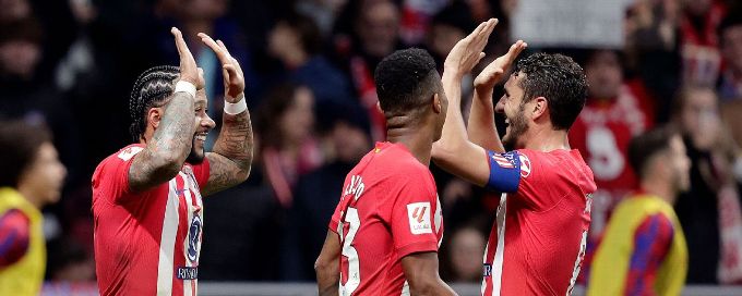 Atletico breeze past Valencia to move to third