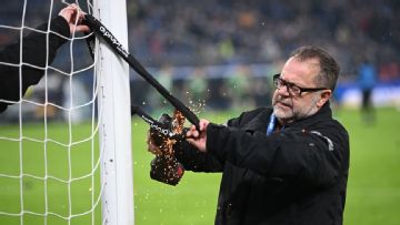 Protesting German fans attach bicycle locks to goal