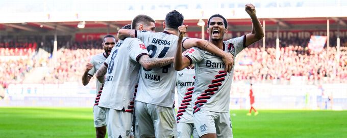 Leaders Leverkusen battle past Heidenheim 2-1 for record-equalling run