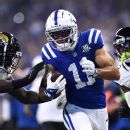 Roadside Assistance - Colts' Anthony Richardson provides roadside assistance to fan