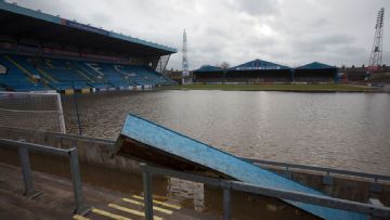 Football's climate change threat: Flooded stadiums, too hot to train