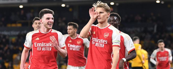 Arsenal bounce back to go top with win over Wolves