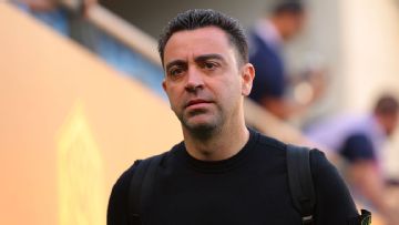 Xavi agrees to remain Barcelona coach in dramatic U-turn