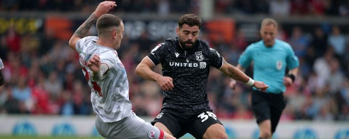 Wrexham hold on to League One top spot after Crawley victory