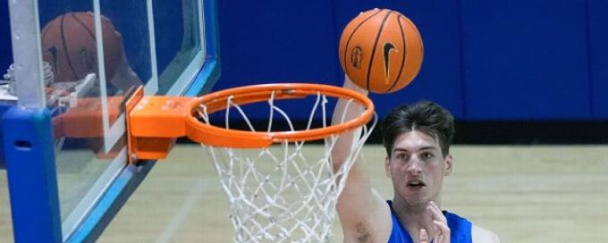 Who are the tallest college basketball players in D-I history?