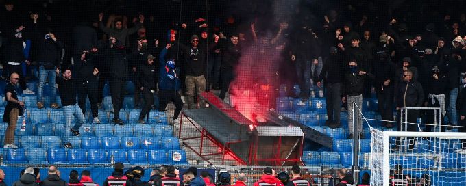 Ligue 1 game abandoned after fans throw flares, start fire in stands