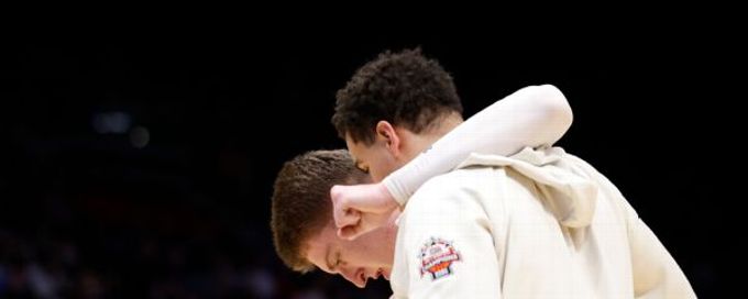 American's Matt Rogers injures right knee in First Four loss
