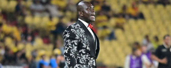 Celebrating Barcelona SC coach Castillo's touchline tuxedos