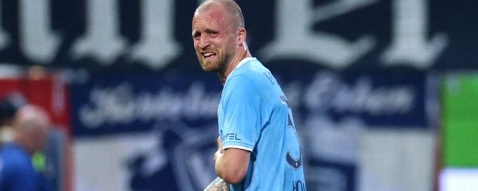 Bundesliga relegation clash leaves two players in hospital
