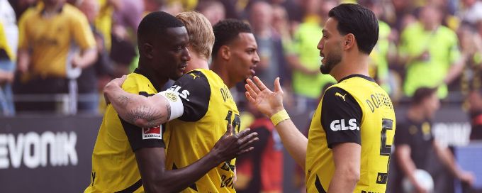 Dortmund snatch last Champions League spot with win over Kiel in season finale