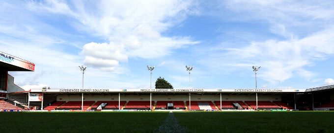 Ian Holloway promises to find Swindon fan who threw seat at GK