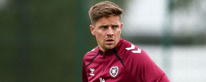 Socceroos midfielder Cameron Devlin coy on Hearts future
