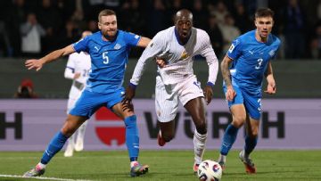 France edge toward World Cup place despite Iceland draw