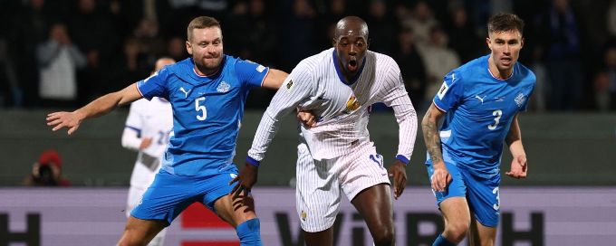 France edge toward World Cup place despite Iceland draw
