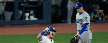 Jays use 9-run 6th to stomp Dodgers in Game 1
