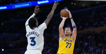 Luka sets Lakers mark with 92 points to open year