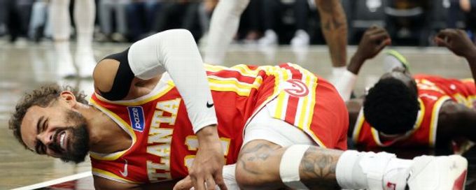 Hawks' Trae Young exits win vs. Nets with right knee sprain
