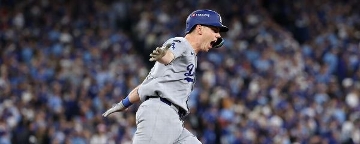 Dodgers steal Game 7 late to repeat as champs