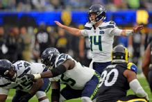Seahawks offer ardent defense of Sam Darnold after his 4 INTs