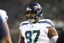 Seahawks DT Johnathan Hankins (back) won't play this season