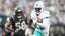 Dolphins' De'Von Achane (rib) didn't return to win as precaution