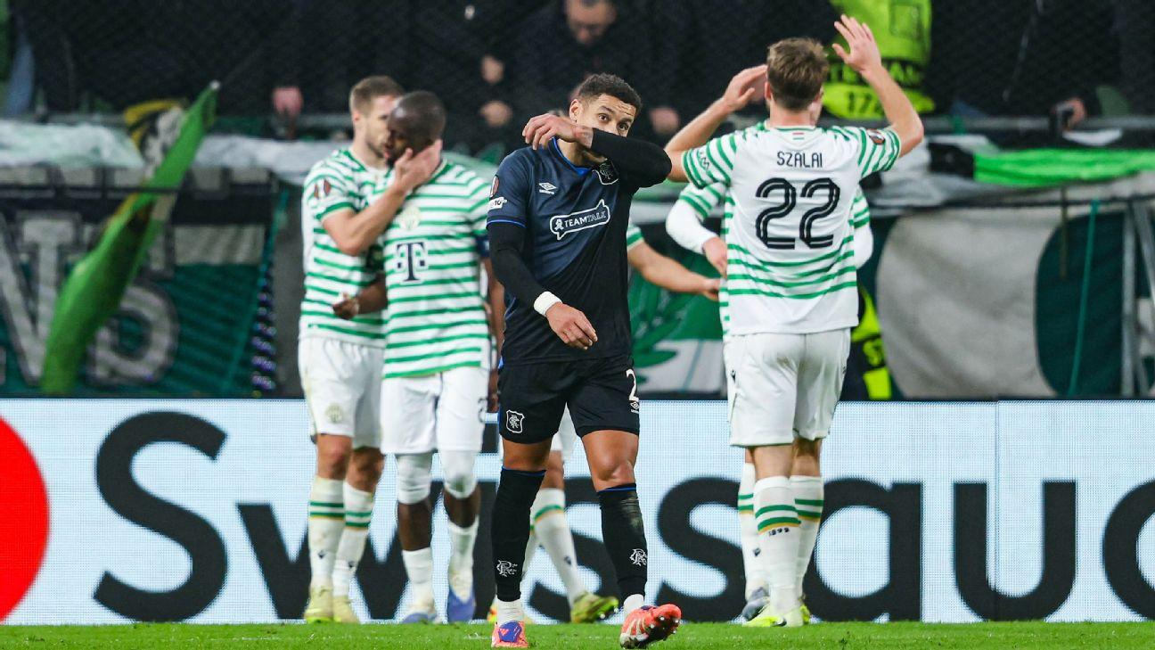 Rangers' James Tavernier looks dejected as Ferencvaros celebrate Barnabás Varga's goal