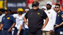 Interim coach Biff Poggi says Michigan players feel 'betrayed'