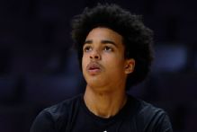 Louisville's Mikel Brown Jr. (lower back) out vs. Tennessee