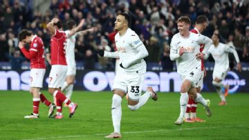 Wrexham sunk by keeper's late error at Swansea