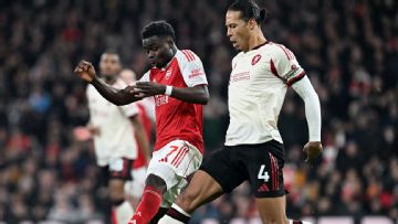 Arsenal inch 6 points clear with Liverpool stalemate