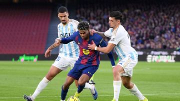 Barcelona beat Real Oviedo to reclaim top spot